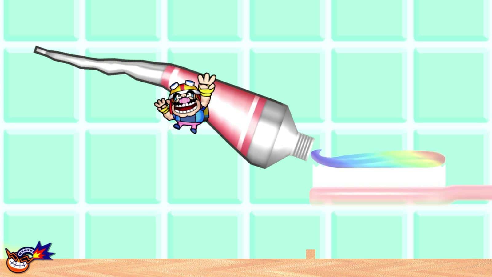 צילום מסך 1 למשחק: WarioWare: Get It Together! הדמות וואריו ומאחוריה רקע של משחת שיניים בצבעי הקשת